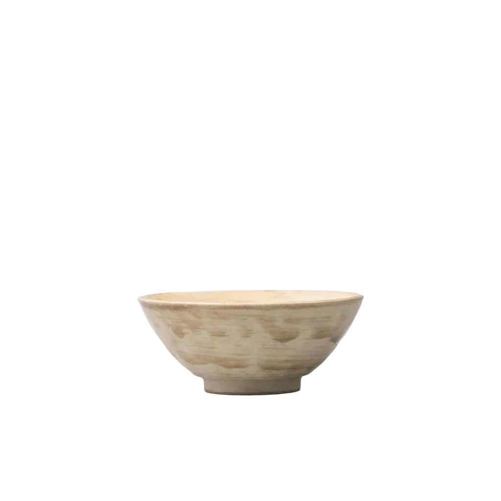 Beige ceramic bowl on a white background